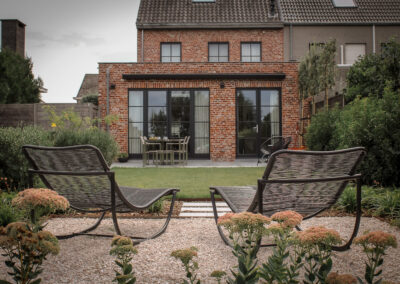 Totaalproject in Aartselaar met polybeton en gezellig kiezelterras